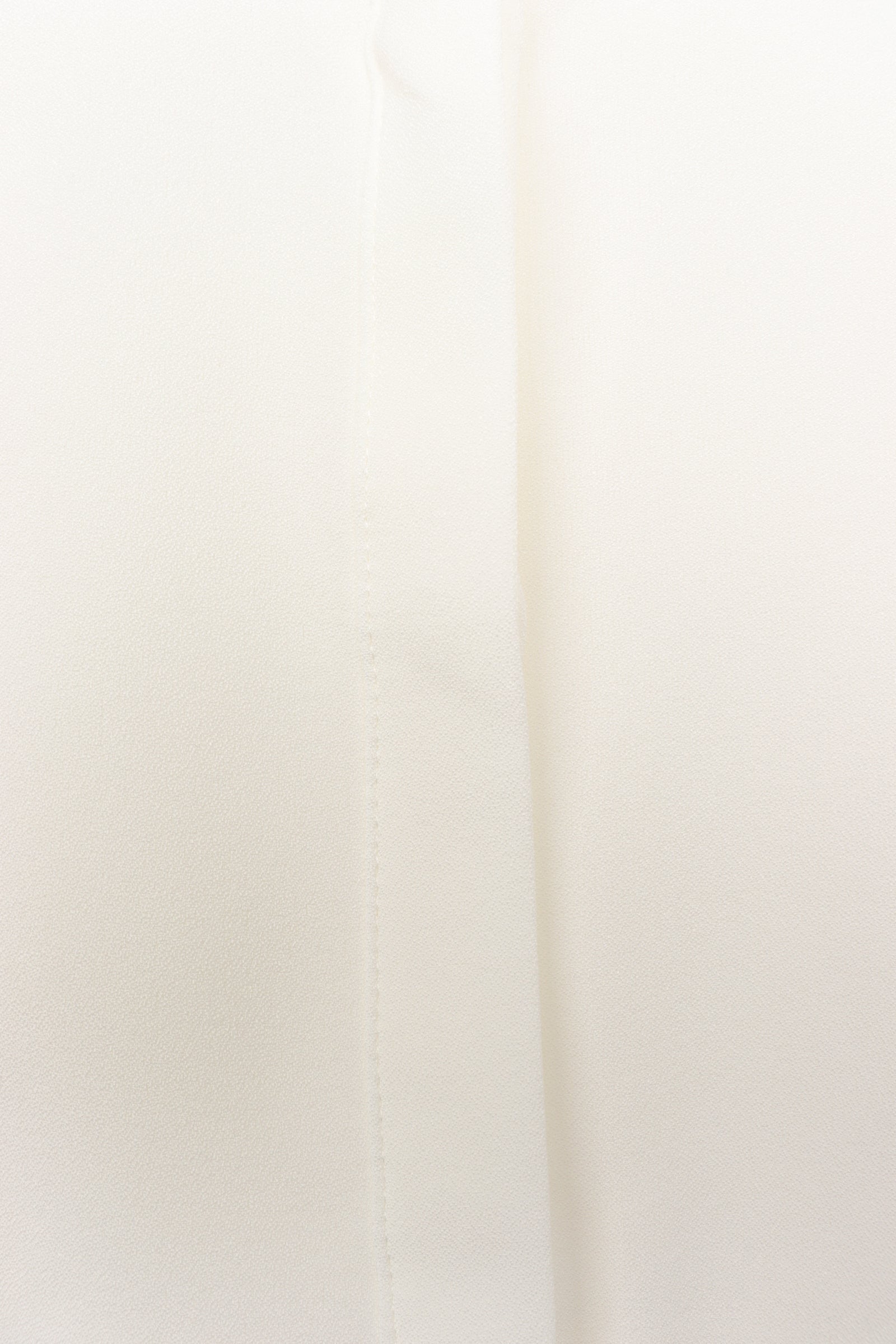 قميص بخطوط أمامية مخيطة