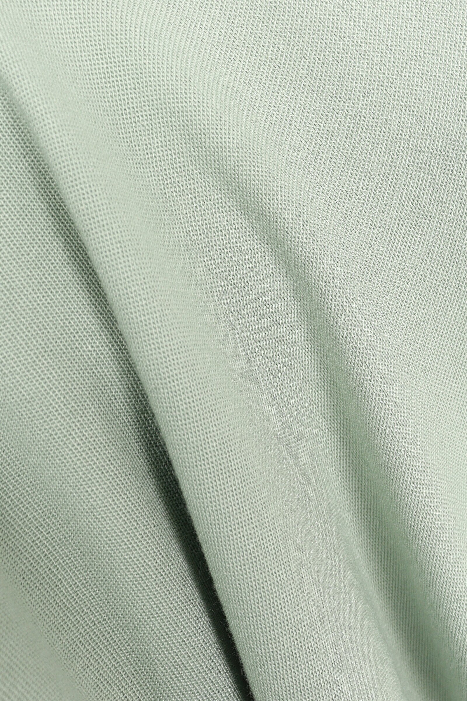 قميص عملي بحافة دائرية