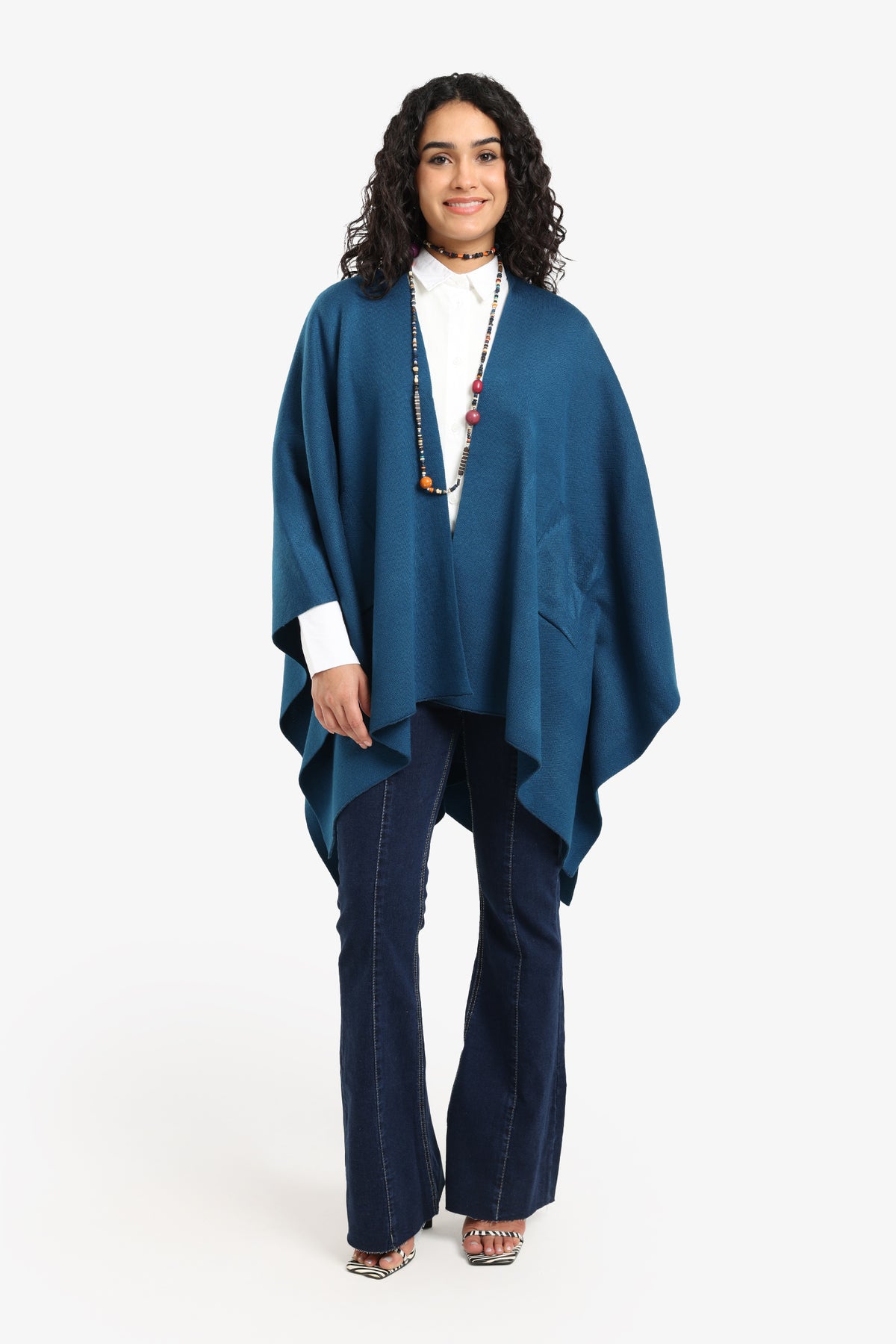 Knitted Poncho with Pockets