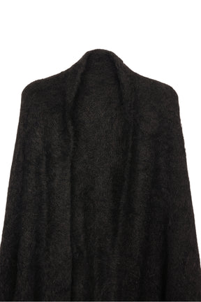 بونشو تريكو مزين بشراشيب